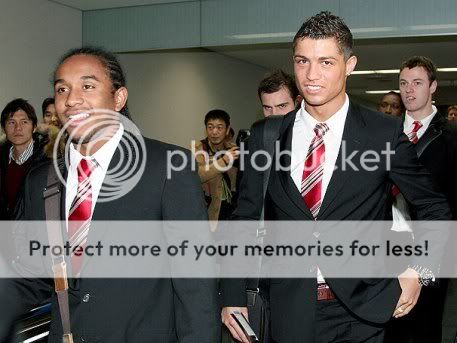 Ronaldo e Anderson na chegada ao Japão